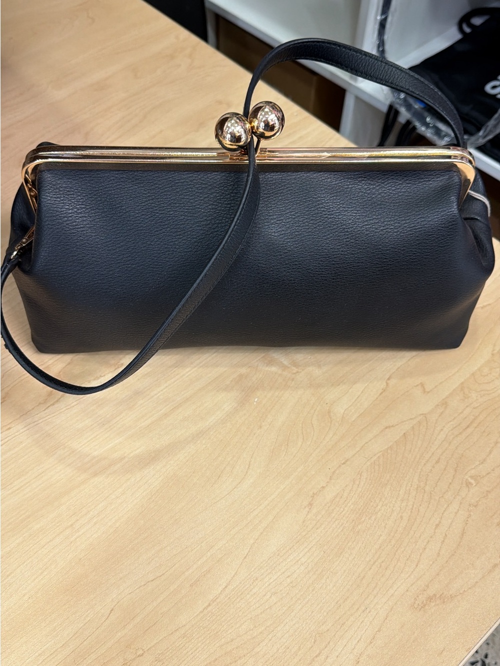Classic Black Frame-Top Shoulder Bag with Gold Hardware